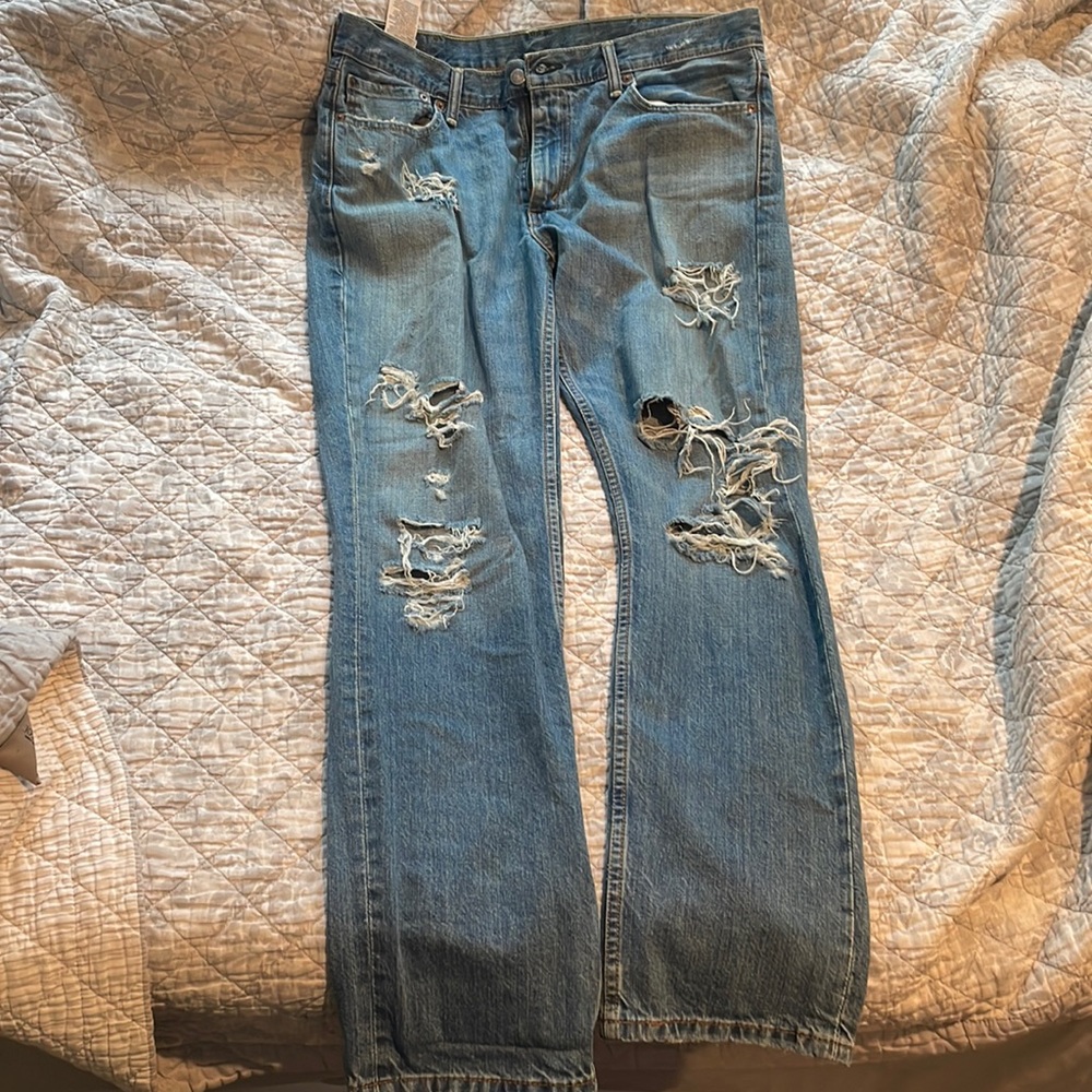 Levi 511 ripped jeans